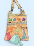 Dog walking bag with poop bag dispenser