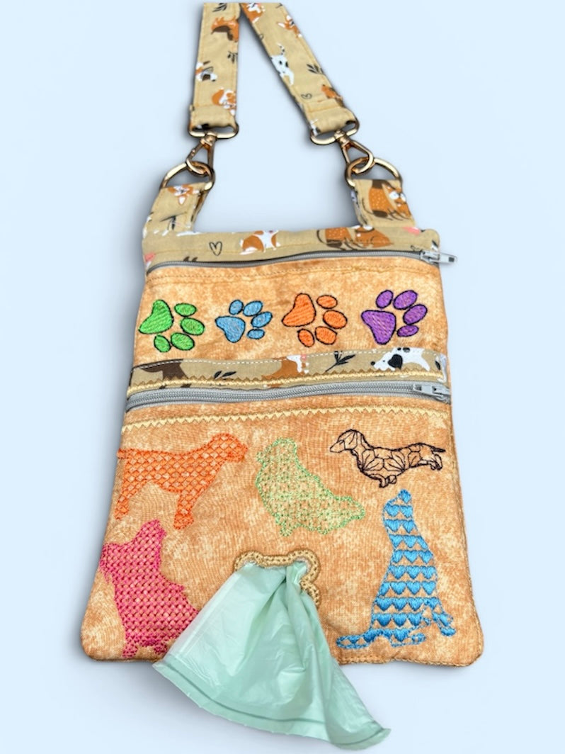 Dog walking bag with poop bag dispenser