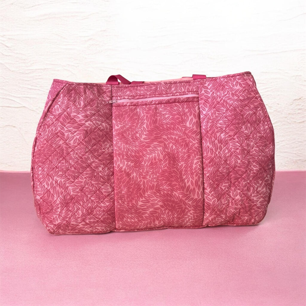 Pink embroidered weekend bag